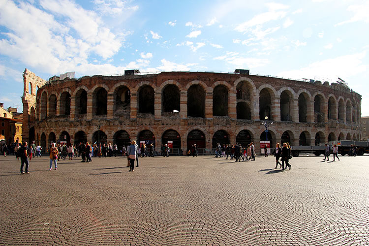 The full Arena di Verona seen from the edge of Piazza Bra