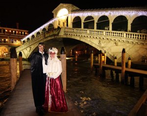 Me and Tim dressed up and posing in front of the Rialto Bridge