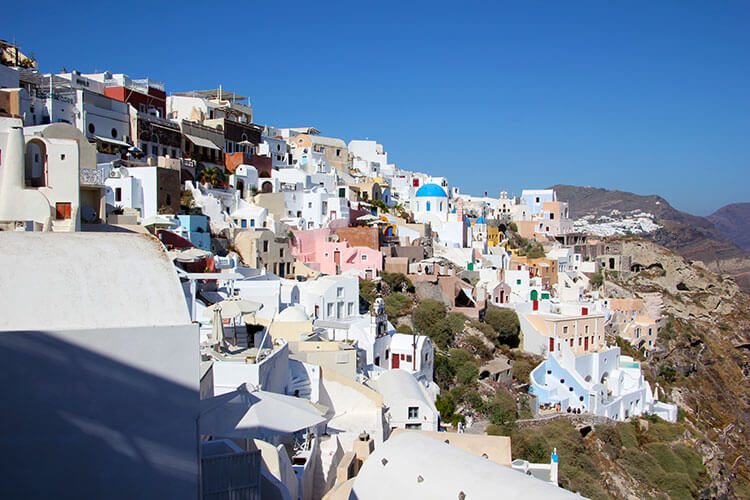A view over Oia from a rooftop taverna