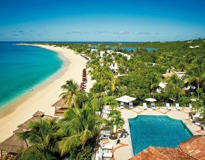 Aerial view of pool and Baie Longue at Belmond La Samanna in Saint Martin