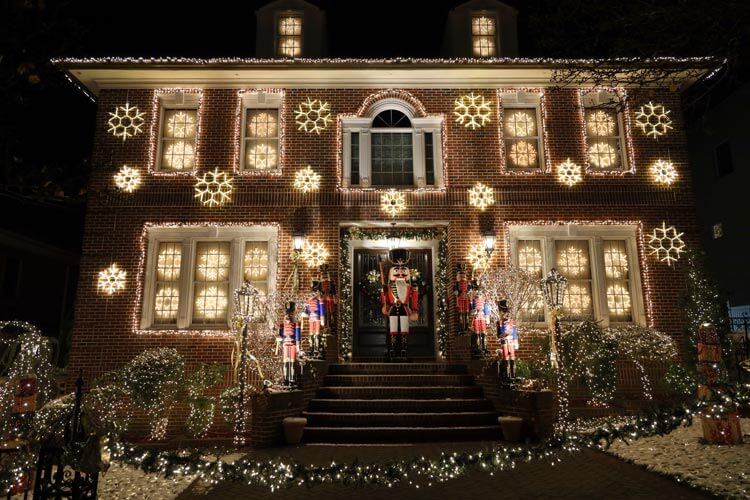 The house is decorated with light up snowflakes and a life-size nutcracker in Dyker Heights, Brooklyn