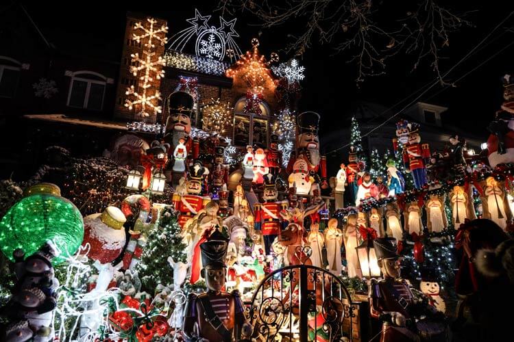 Lucy Spata's house with her original 40 angels plus snowmen, santas, and holiday characters in Dyker Heights, Brooklyn