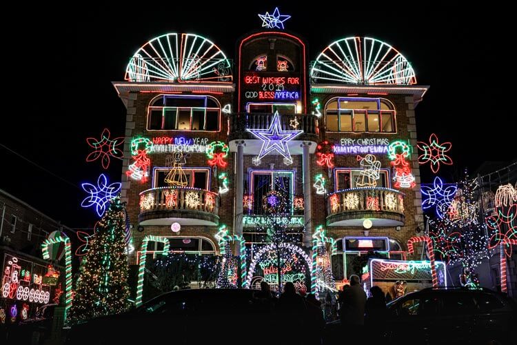 Sam the Greek's house with 295,000 lights including stars, an animatronic hot air balloon, santa hats and more in Brooklyn