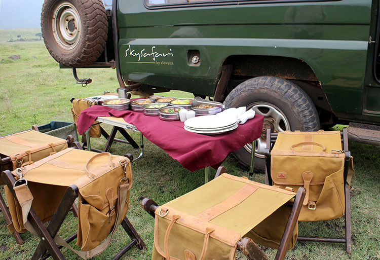 Our bush picnic lunch set up on a table with camp chairs 