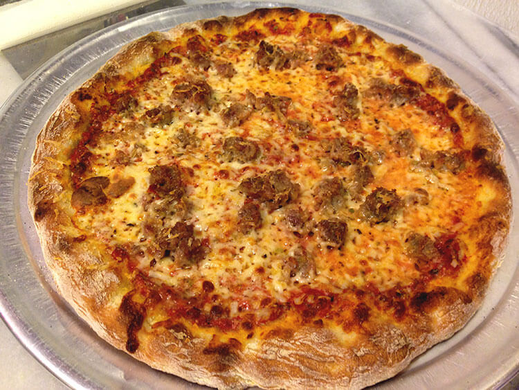 The "New York Slice" with Pizza School NYC's homemade sausage 