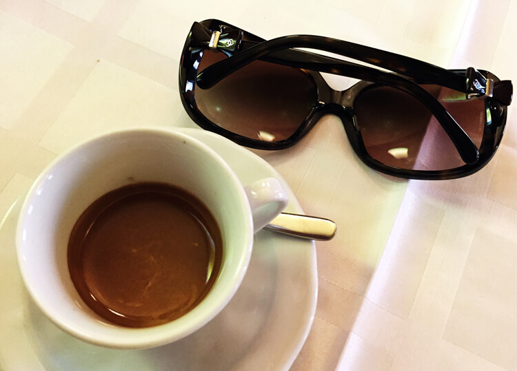 Traditional Italian coffee. Two small colorful espresso cups on a