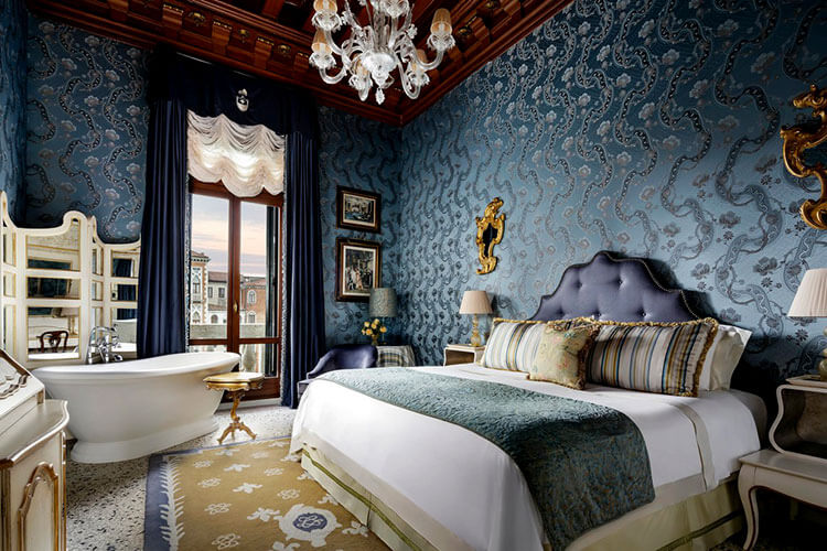 A room in blue with a room of the Grand Canal in Gritti Palace in Venice, Italy