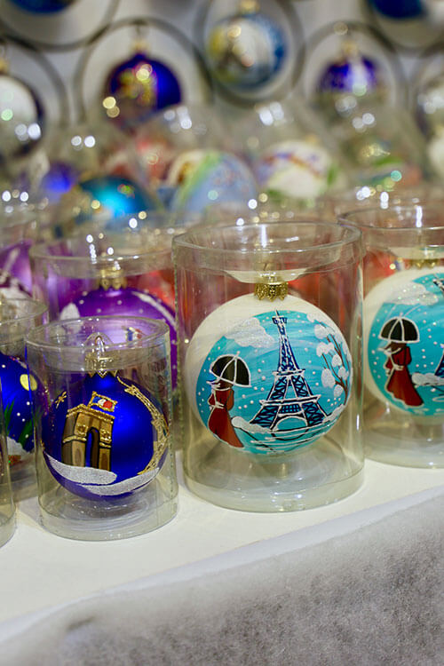 Christmas bulb ornaments painted with the Eiffel Tower found at a Christmas market in Paris, France