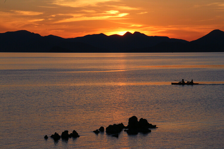 Kayking at sunset at Two Seasons Coron Island Resort