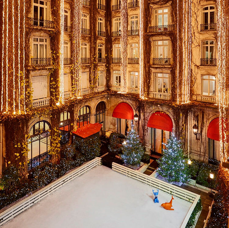 The ice skating rink in the interior courtyard at Plaza Athénée in Paris, France