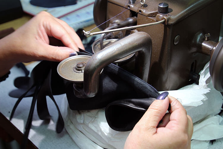 The fingers are sewn together using a special sewing machine