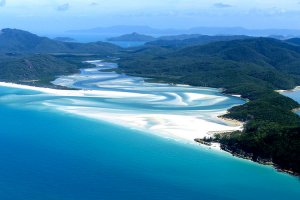 Swirls of white sand banks in the Whitsundays as seen from the air