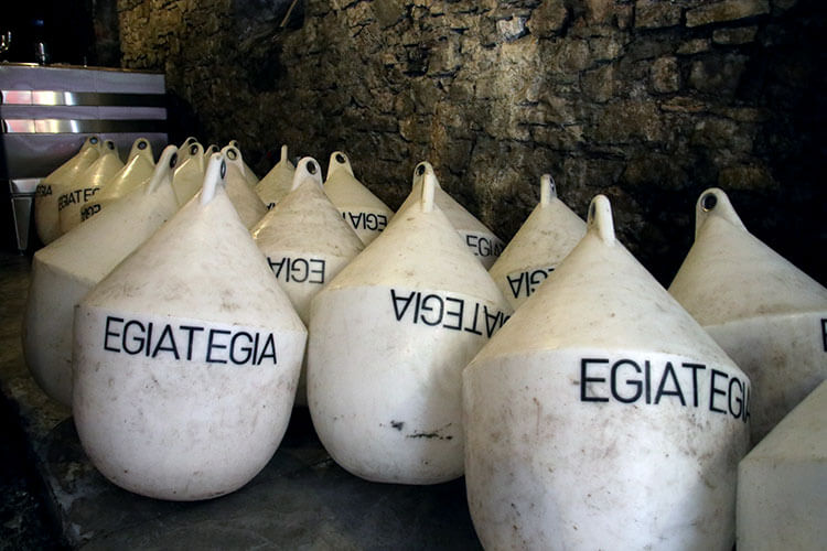 The buoy-like tanks of Egiategia sit in the cellar