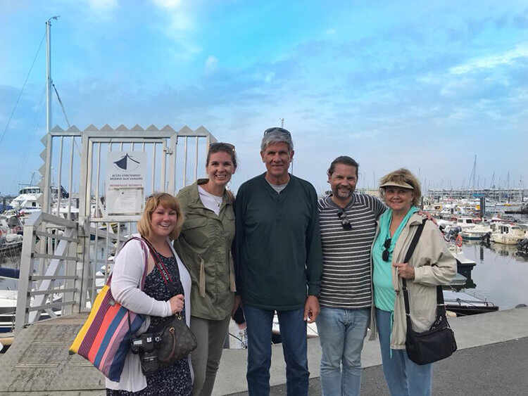 Jennifer poses with a group of readers at the marina in Arcachon, France
