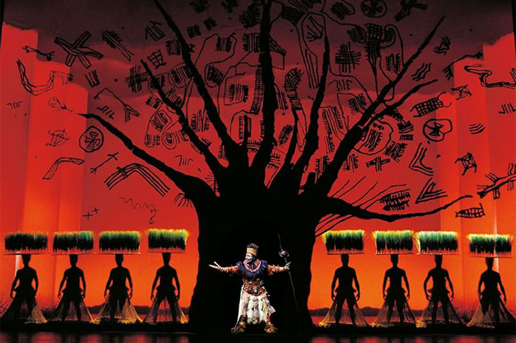 Characters from Disney's The Lion King are dressed up as trees and grass to transform the London theater in to Africa's pride lands
