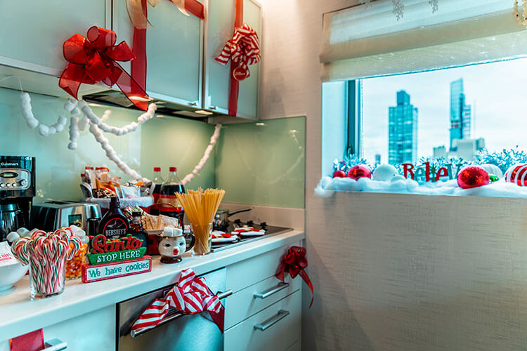 The kitchen stocked with candy canes, marshmallows, hot chocolate, soda, and more in the Elf Suite at Club Wyndham Midtown 45