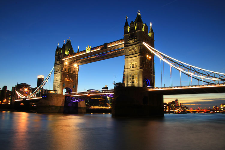 Tower Bridge as the lights come on during blue hour just after the sunset in London