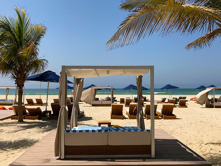 A cabana on the private beach at Al Baleed Resort by Anantara