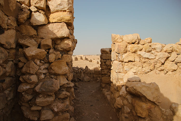 Inside one of the towers with a close up of the building stones used at Ubar