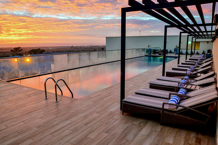 The rooftop infinity pool at sunrise at Hilton Garden Inn Nairobi Airport