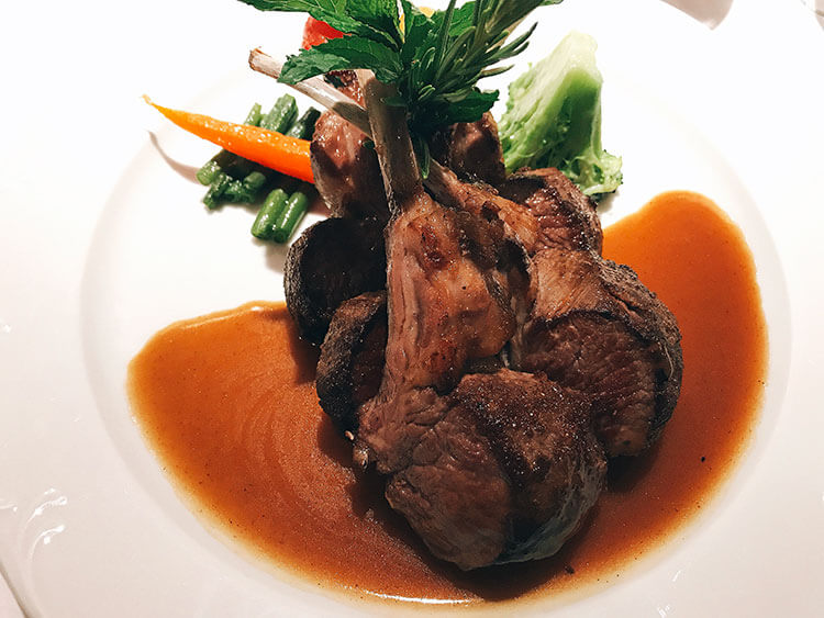 Rack of lamb with seasonal vegetables at Mandhari at the Nairobi Serena Hotel