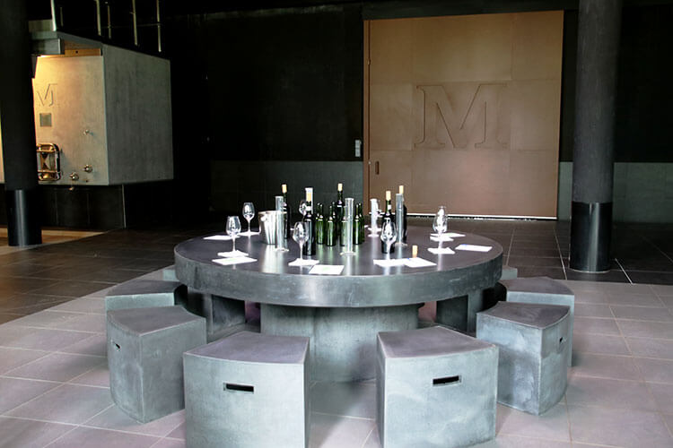 Cellar master workshop set up with beakers, worksheets and the wines in the cellar at Château Malescasse