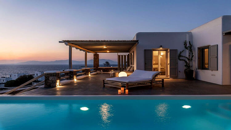 The pool at sunset at Villa Temptation in Mykonos