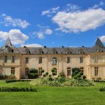 The castle of Reignac has two small towers on each end of the house and dates from the 16th century