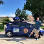 Tim poses with his car outside Château Soutard in Saint-Émilion