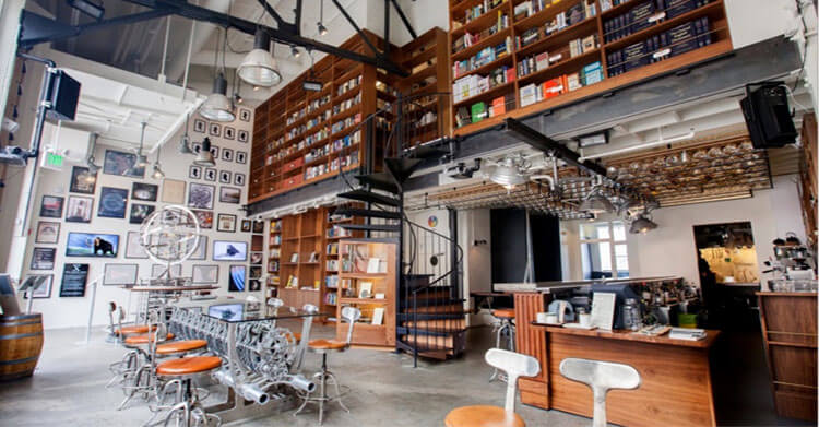 The bright space at Interval at Long Now with two levels of bric-a-brac to check out while enjoying a coffee or drink