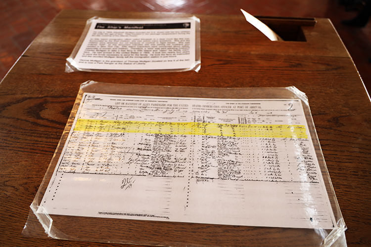 A laminated ship manifest of passengers arriving in Ellis Island on display in the Reigstry Room