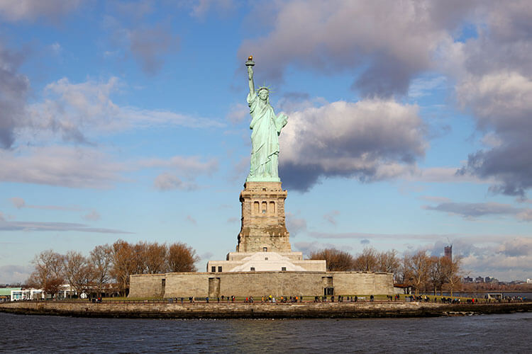 View of the Statue of Liberty as you take the ferry over to Liberty Island in NYC