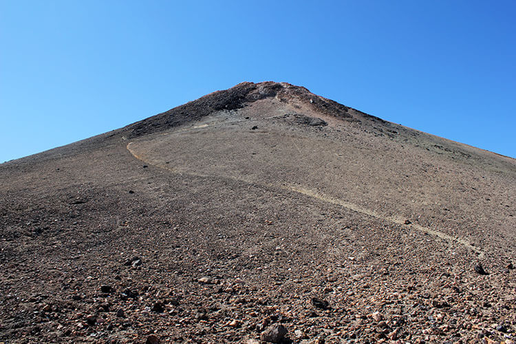 On the lava rock cone of the summit of Mount Teide in Tenerife