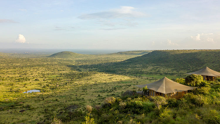 Two of the individual tents sit on an escarpment above the Laikipia plains at Loisaba Lodo Springs