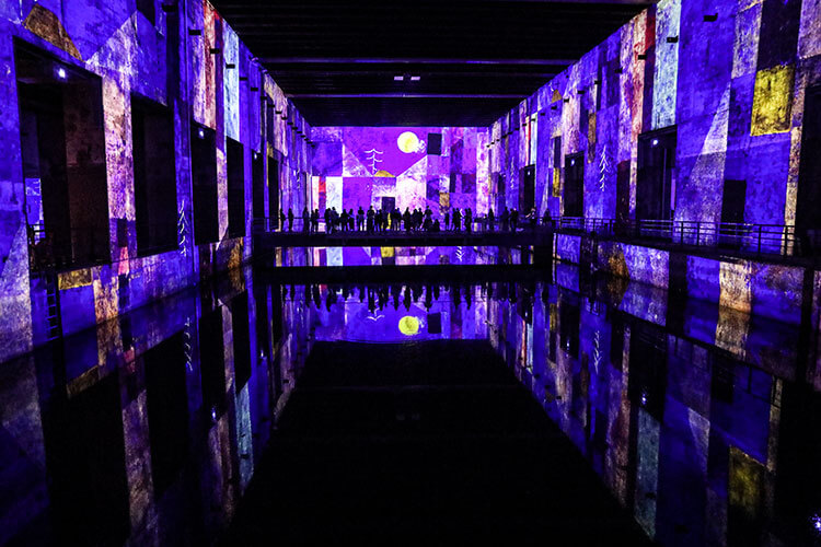 Works of Gustav Klimt are digitzed and displayed as digital art works inside a former German u-boat submarine base at the Bassins de Lumières in Bordeaux