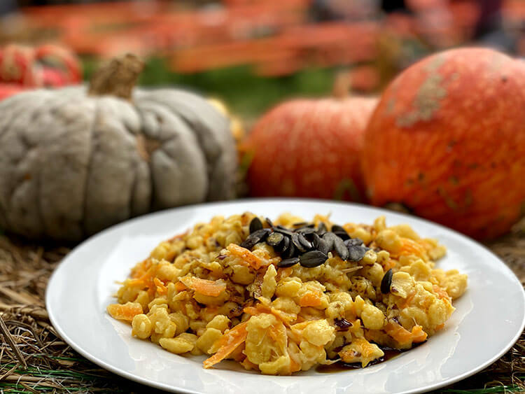 Pumpkin spaetzel topped with pumpkin seeds and drizzled with pumpkin seed oil at the Ludwigsburg Kürbisausstellung