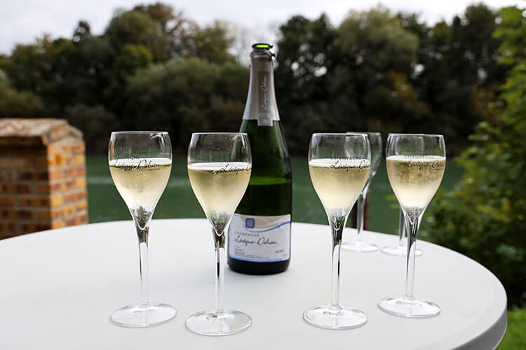 Tasting Champagne along the Marne River at one of the stops in the VW Kombi tour with Champagne Lévêque-Dehan