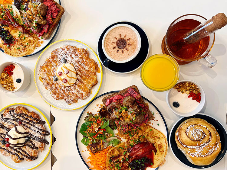Suzzi Kafe bruch with Swedish waffles, yogurt with granola, potato pancakes, and open-faced Swedish sandwich