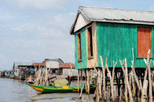 Colorful houses of Ganvie built on stilts in the middle of a lake
