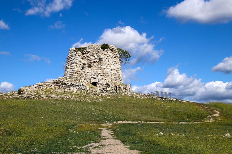 The tower of Nuraghe Is Paras rises on a small hill outside of Isili, Sardinia