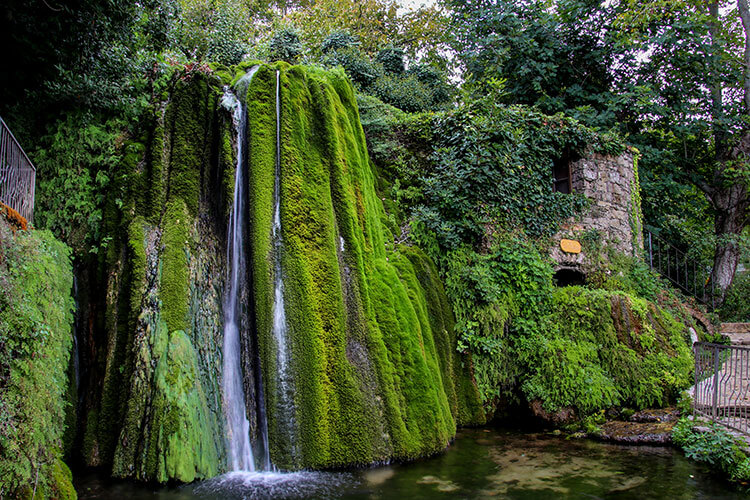 The Saint Valentine Waterfall with Sadali's historic watermill next to it in Sadali, Sardinia