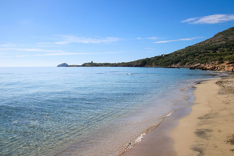 The clear water and soft white sand of Spiaggia Coaquaddus in Sant'Antioco, Sardinia