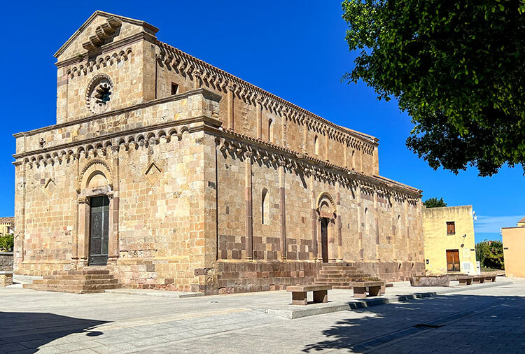 A view of the cathedral from the front facade and side in Tratalias, Sardinia