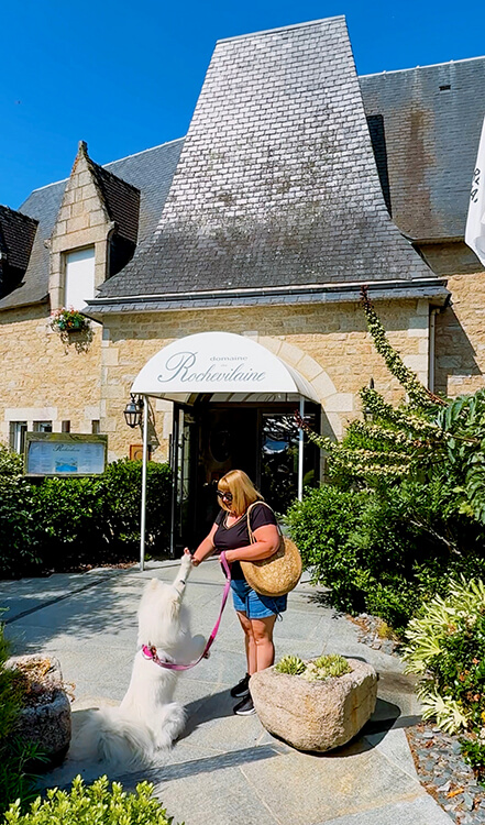 Coco gives Jennifer a high five outside reception at Domaine de Rochevilaine