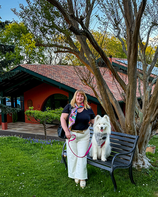 Jennifer and Coco pose for a photo in front of the main hotel building of Les Frères Ibarboure