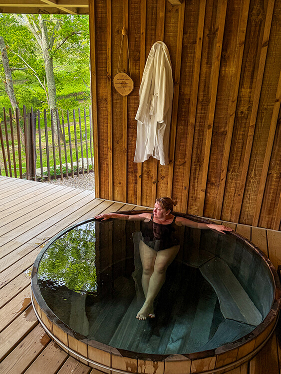 Jennifer relaxes in the Nordic bath in the spa cabin at Les Frères Ibarboure