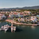 Drone shot of the private island ofo Hotel L'Île de la Lagune in Saint-Cyprien, France
