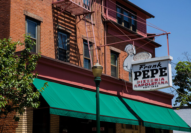 The exterior of the original Frank Pepe Pizzeria on Wooster Street in New Haven, Connecticut