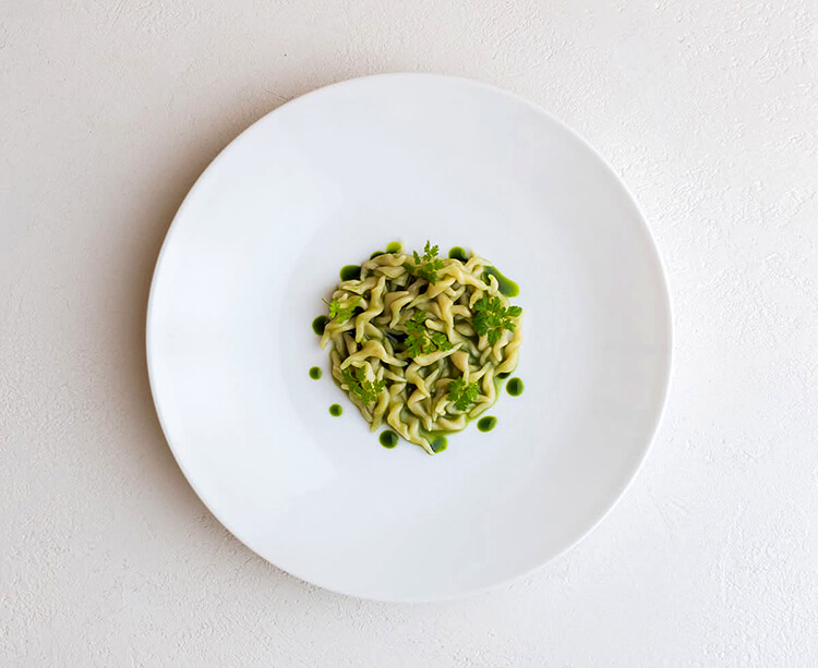 Trofie, handmade one by one, with zucchini sauce made from zucchini from Piazza Duomo's garden
